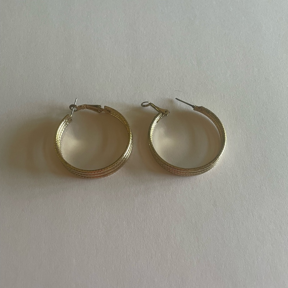 Gold tone pierced hoop earrings